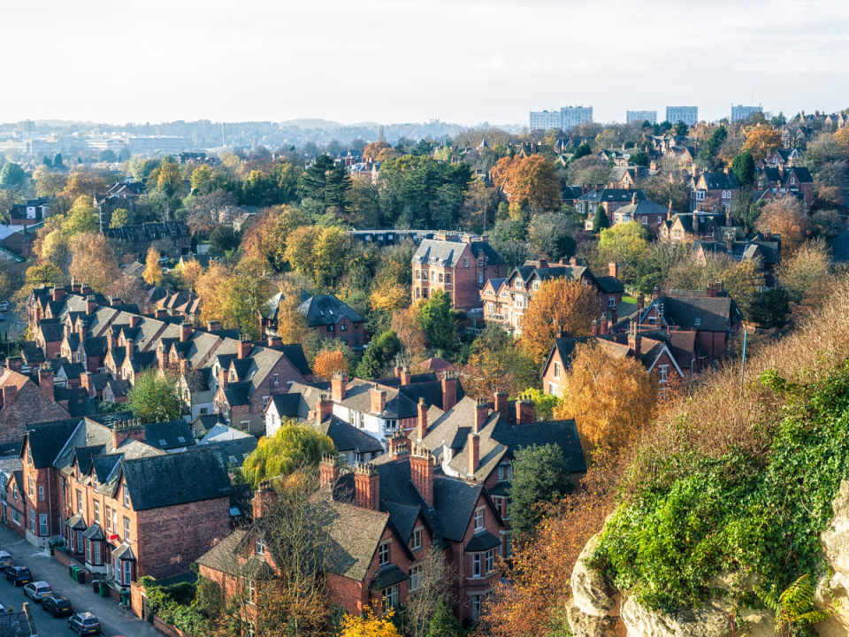 aerial view of a residential area in Nottingham, England, interspersed with urban trees.